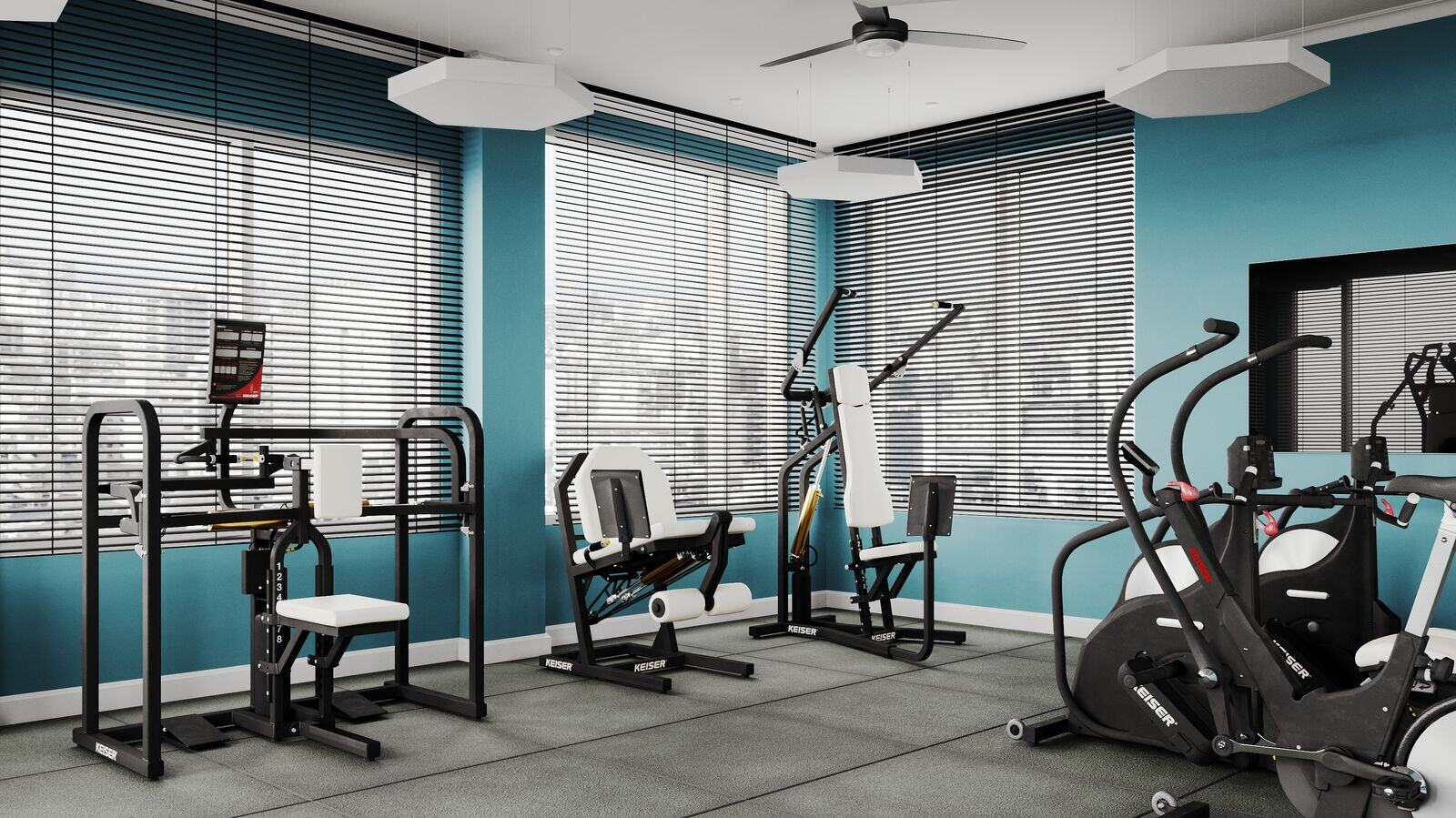 Small-sized facility space with various Keiser A300 machines in custom colors